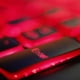a close up of a red and black keyboard