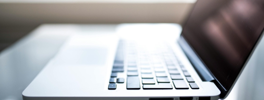 shallow-focus-photography-of-macbook