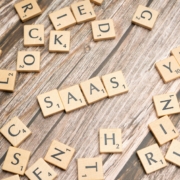 scrabble-letters-spelling-saas-on-a-wooden-tabl